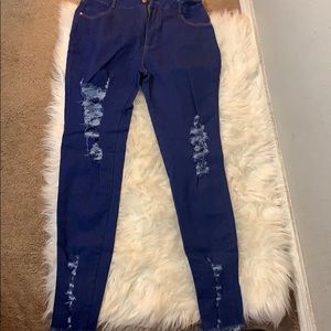 Dark blue jeans with rip